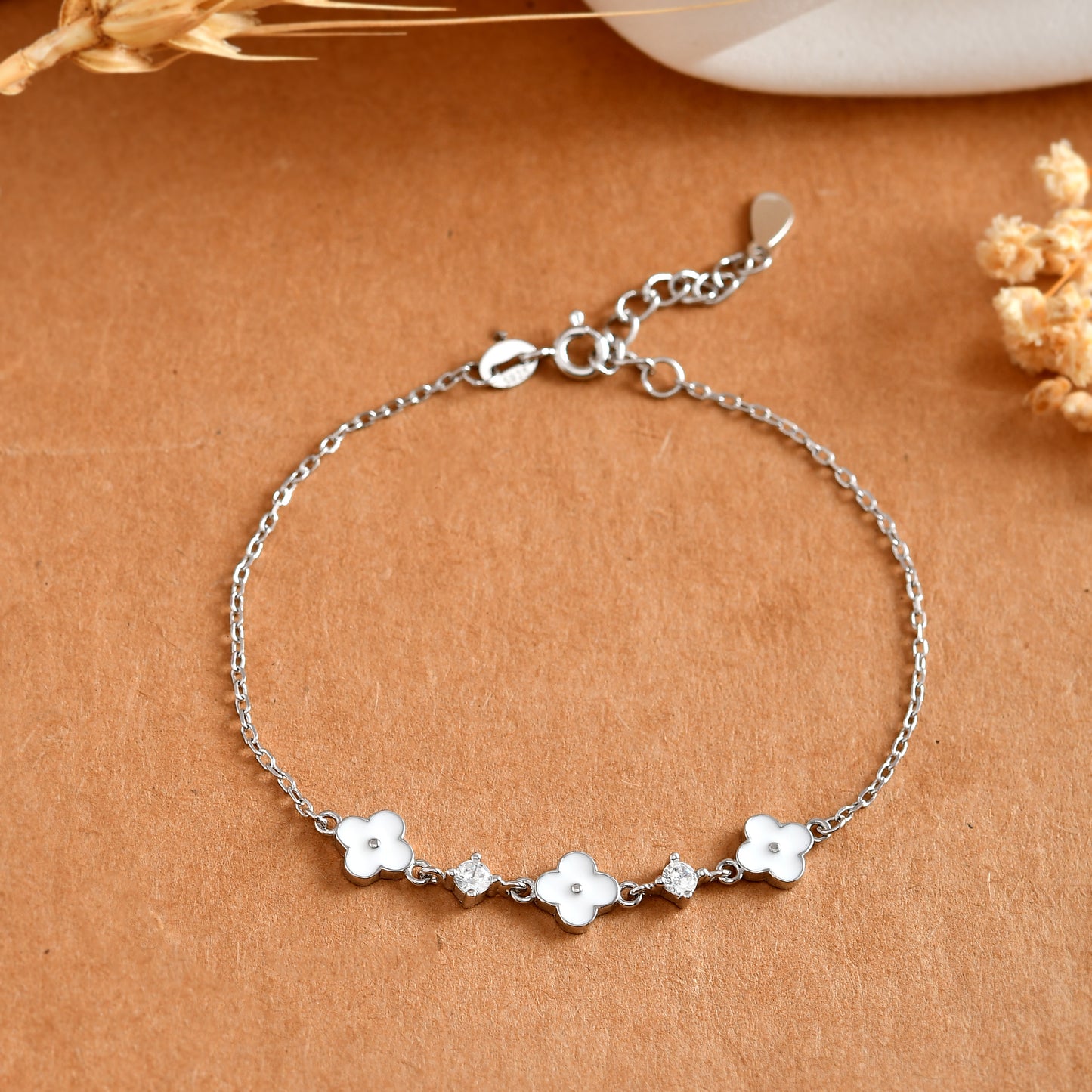 Sterling Silver Clover Bracelet – White Enamel Charms & Cubic Zirconia Sparkle