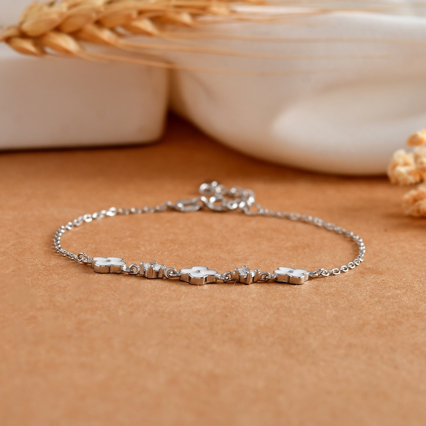 Sterling Silver Clover Bracelet – White Enamel Charms & Cubic Zirconia Sparkle