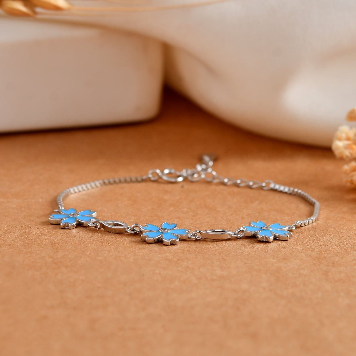 Sterling Silver Blue Enamel Flower Charm Bracelet with Cubic Zirconia Centers – Adjustable Floral Jewelry Gift