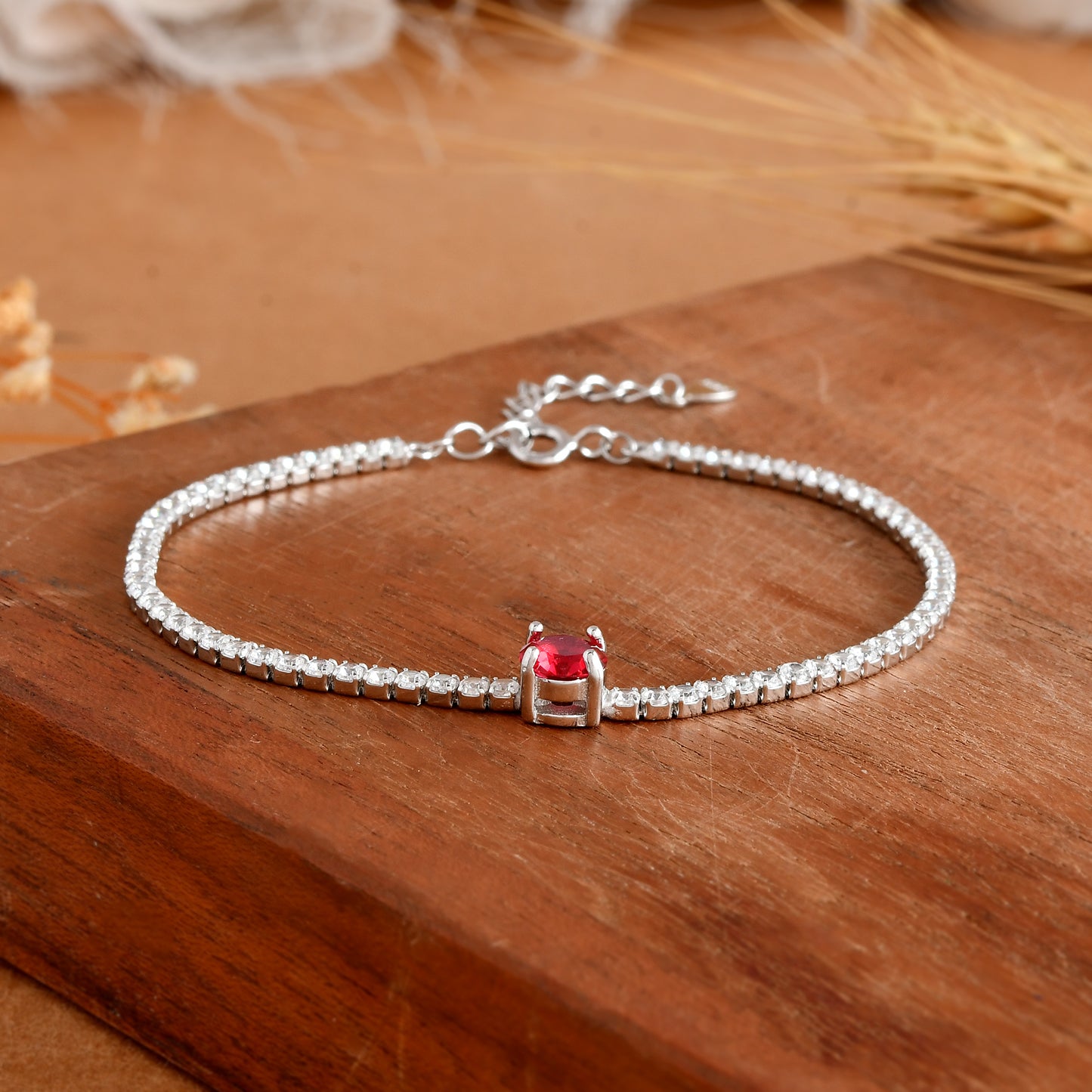 Sterling-Silver Tennis Bracelet with Red Ruby-Tone Center Stone