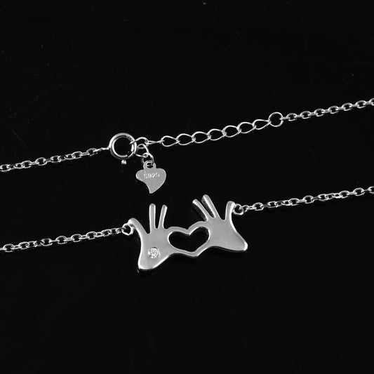 Sterling Silver Hand Heart Pendant Necklace