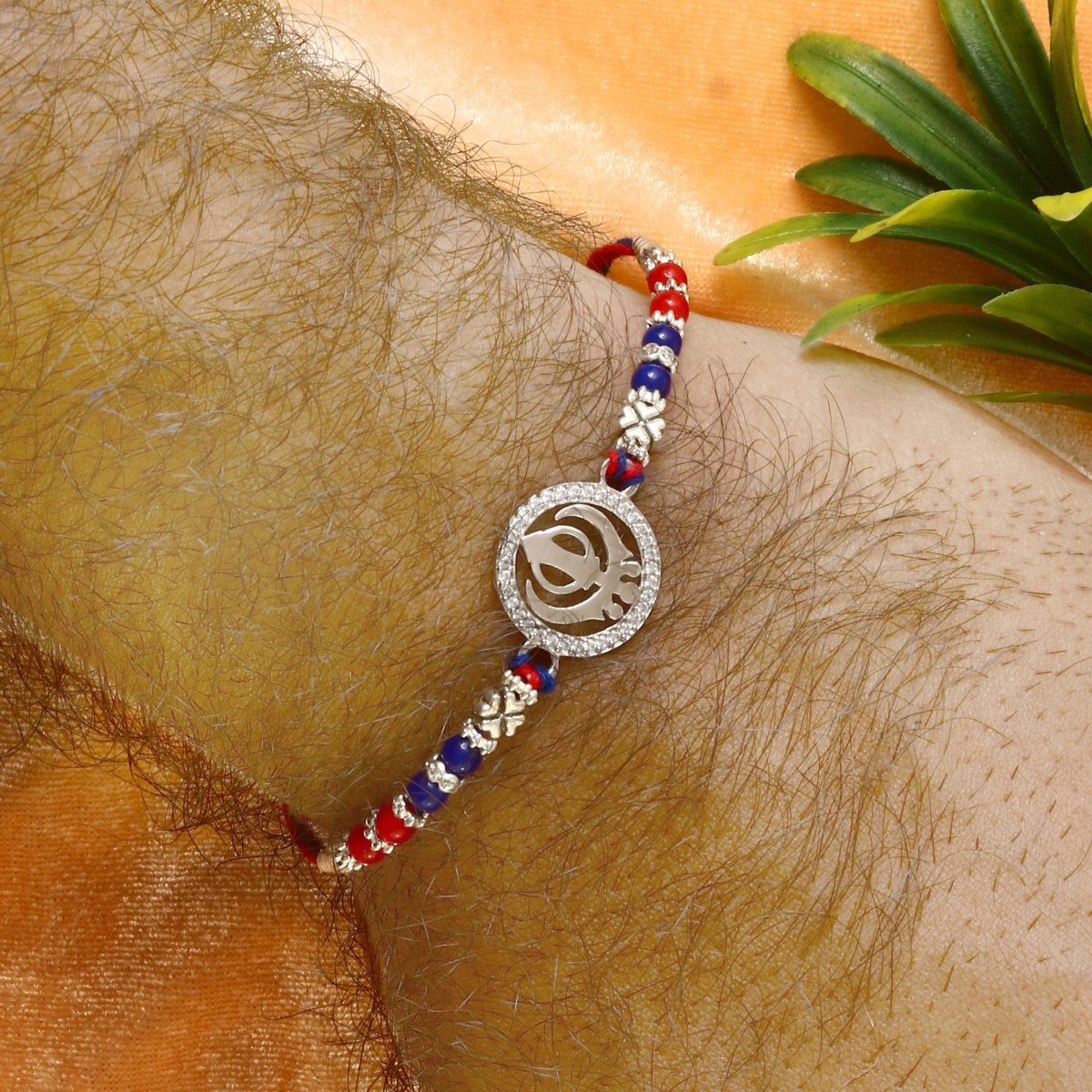 Khanda Symbol Rakhi with Red-Blue Beads | Sikh Religious Rakhi for Brother - Zirak Silver