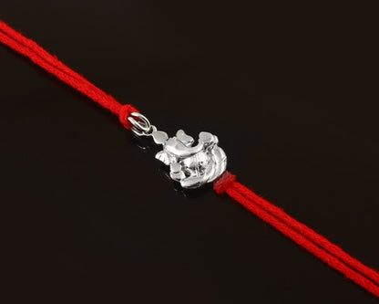925 Silver Ganesha Rakhi with Red Thread – Auspicious Lord Ganpati Rakhi for Brother - Zirak Silver