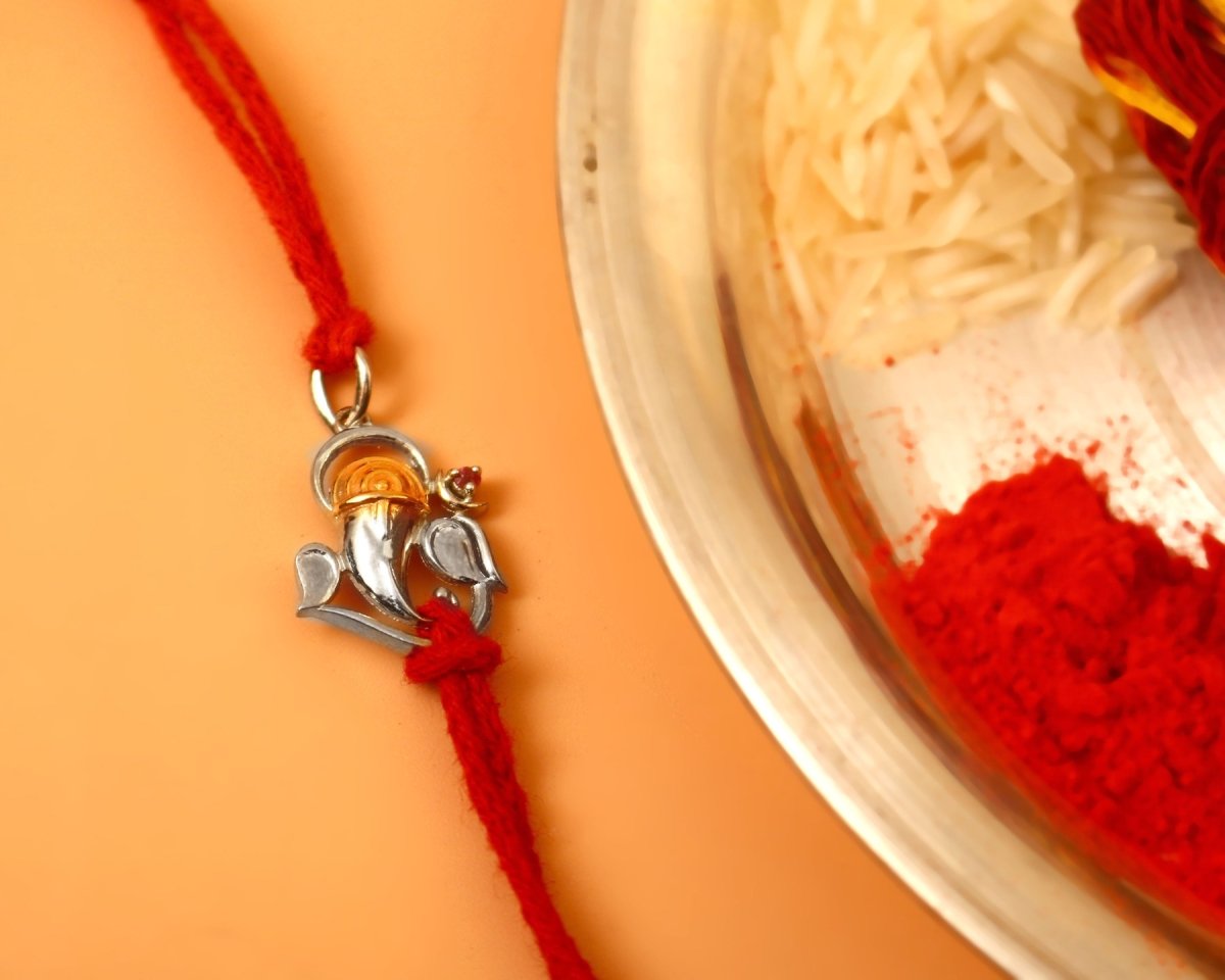 925 Silver Ganesha Rakhi with Red Thread | Lord Ganpati Rakhi for Brother - Zirak Silver