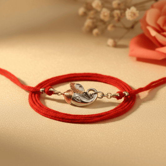 925 Silver Ganesha Trunk Rakhi | Two-Tone Polished Charm on Red Thread - Zirak Silver