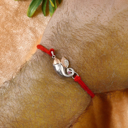 925 Silver Ganesha Trunk Rakhi | Two-Tone Polished Charm on Red Thread - Zirak Silver