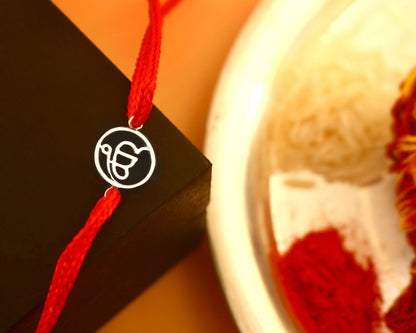 925 Silver “Ik Onkar” Rakhi on Red Cotton Thread – Minimalist Sikh Raksha Bandhan Bracelet - Zirak Silver
