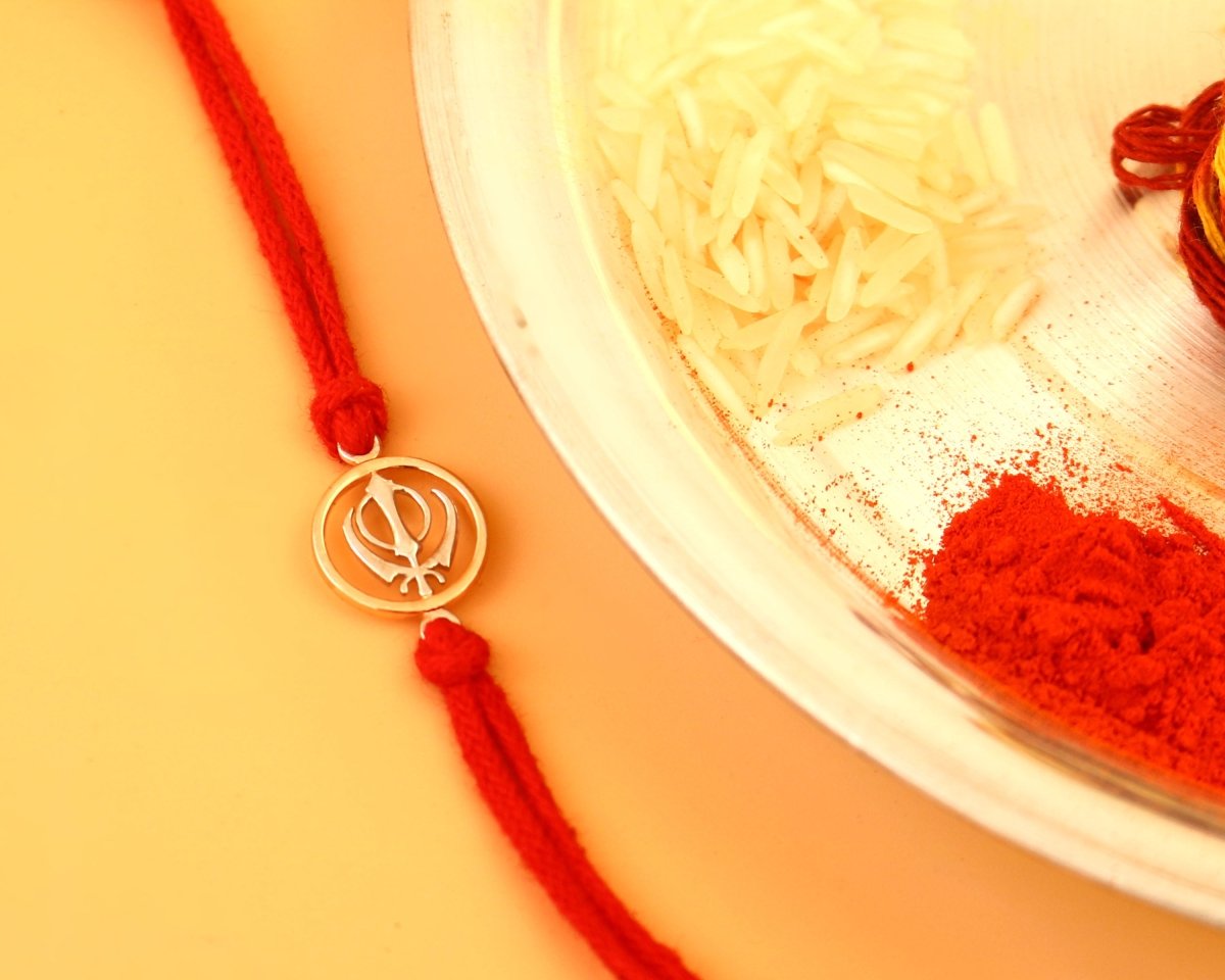 925 Silver Khanda Rakhi in Gold-Tone Circle on Red Cotton Thread – Sterling Sikh Raksha Bandhan Bracelet - Zirak Silver