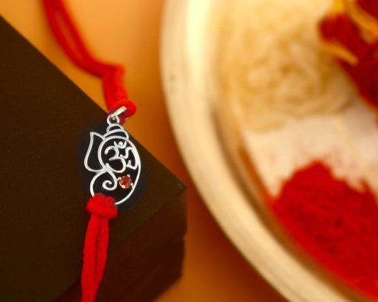 925 Silver Om Ganesha Rakhi | Minimal Ganpati Rakhi with Red Thread - Zirak Silver
