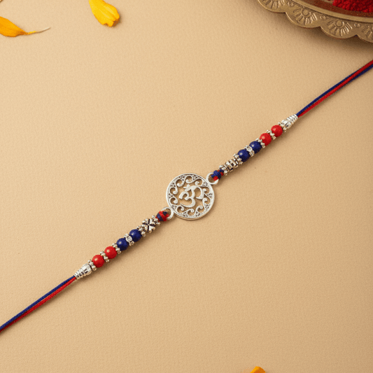 925 Silver Om Rakhi | Traditional Red-Blue Beaded Thread with Intricate Om Symbol for Men - Zirak Silver