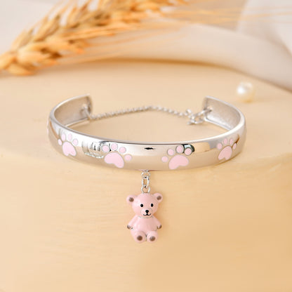 925 Sterling Silver Paw-Print Bangle with Dangling Teddy Bear Charm – Adjustable Kids Bracelet