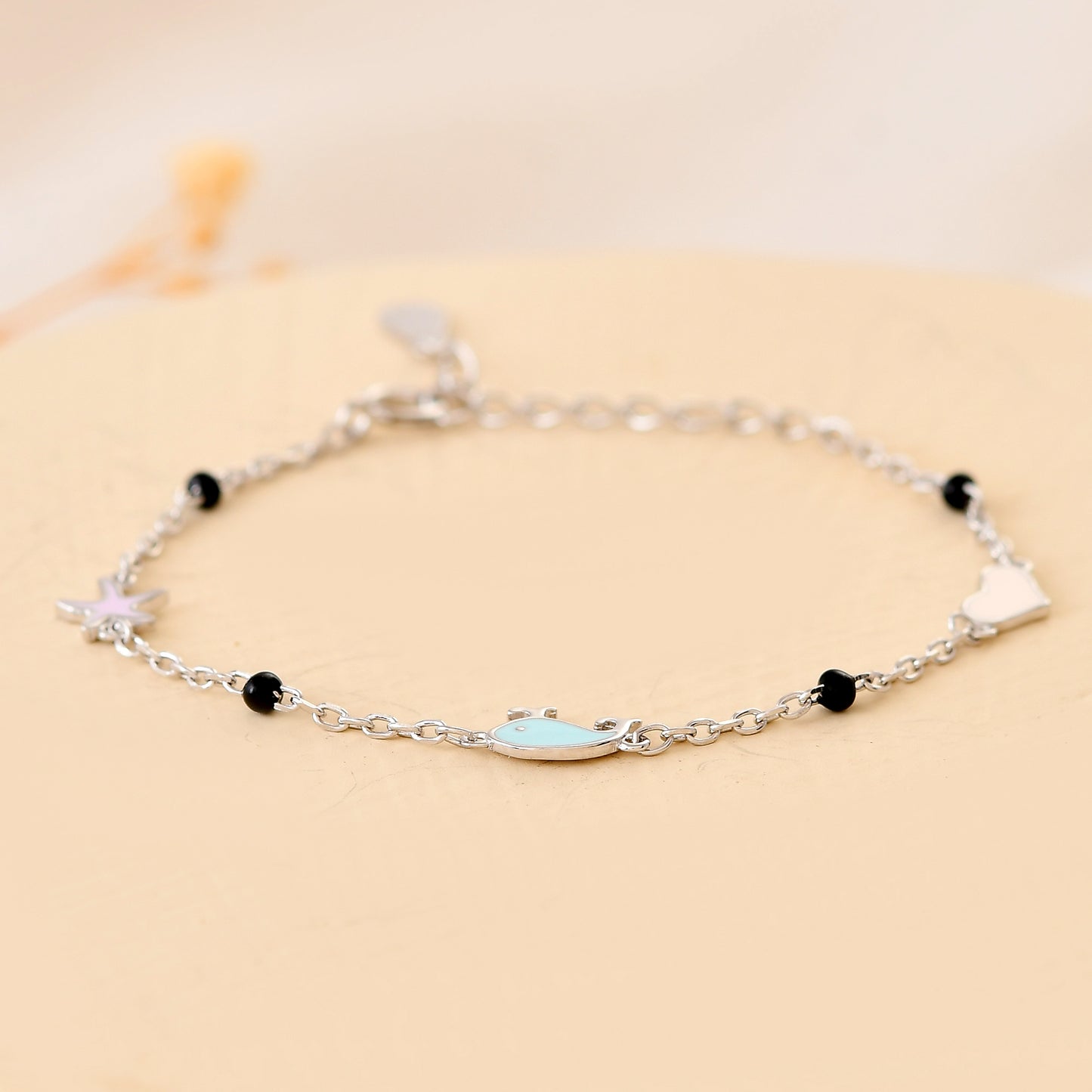 Star-Fish-Heart Sterling-Silver Nazariya Bracelet | Pastel Charms & Black Beads