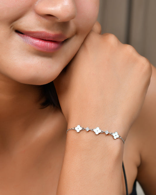 Sterling Silver Clover Bracelet – White Enamel Charms & Cubic Zirconia Sparkle