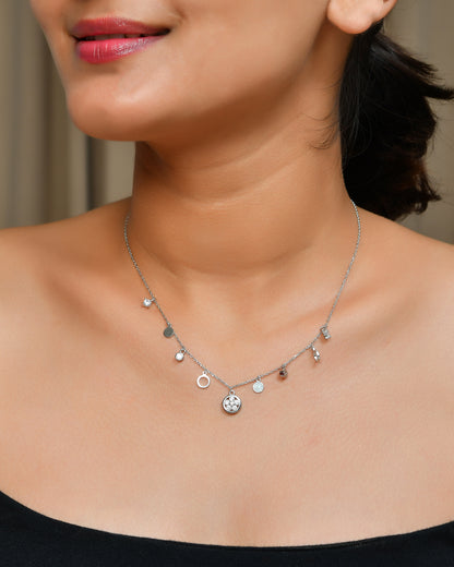 Sterling Silver Mixed-Charm Dangle Necklace – CZ Discs, Open Rings & Mini Drops