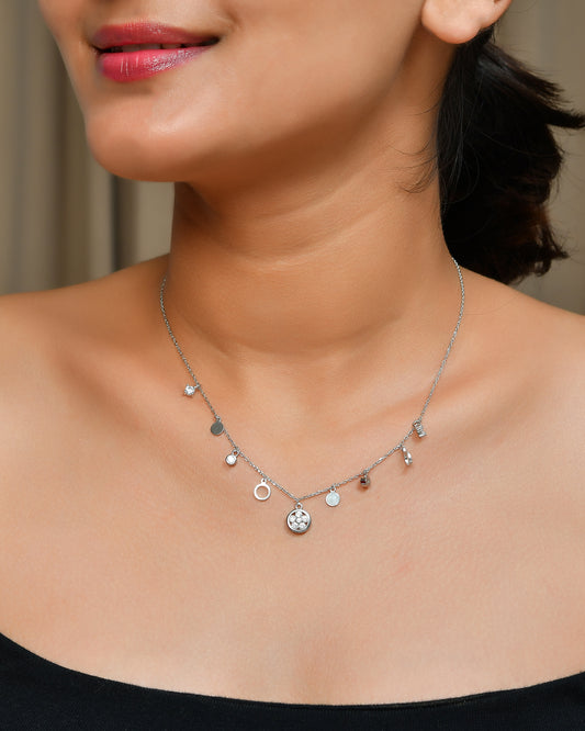 Sterling Silver Mixed-Charm Dangle Necklace – CZ Discs, Open Rings & Mini Drops