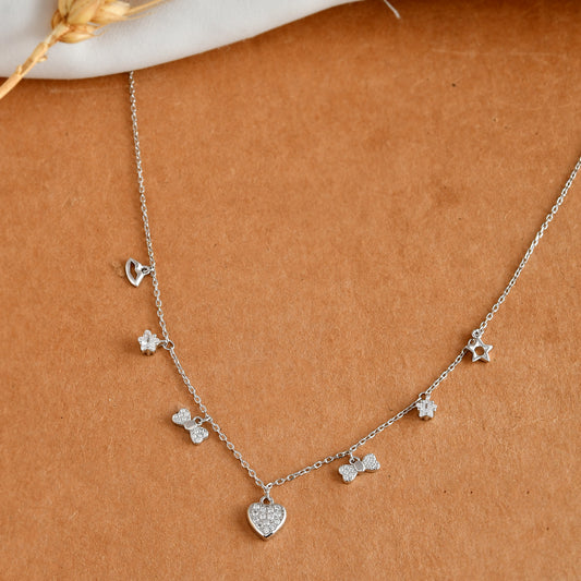 Sterling Silver Mixed-Charm Necklace – Pavé Heart, Star, Bow & CZ Dangles