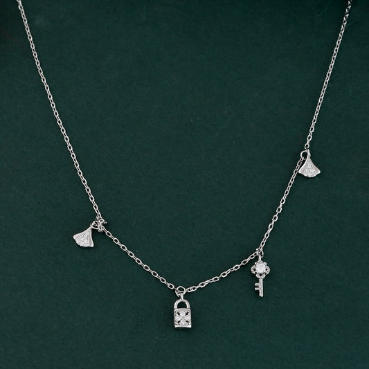 Sterling Silver Lock & Key Charm Necklace – Dainty CZ Padlock, Key & Ginkgo Leaf Pendant Choker
