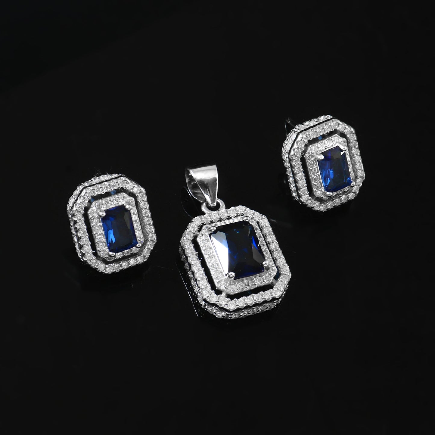 Regal Blue Sapphire Halo Pendant Set in 925 Silver