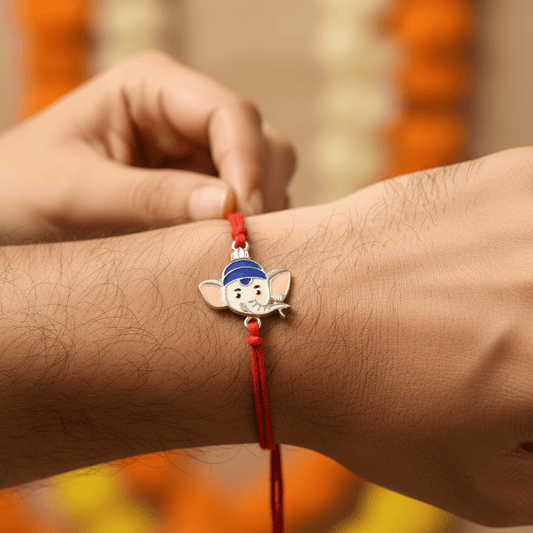 Dual-Tone Lord Ganesha Silver Rakhi with Red Thread - Zirak Silver
