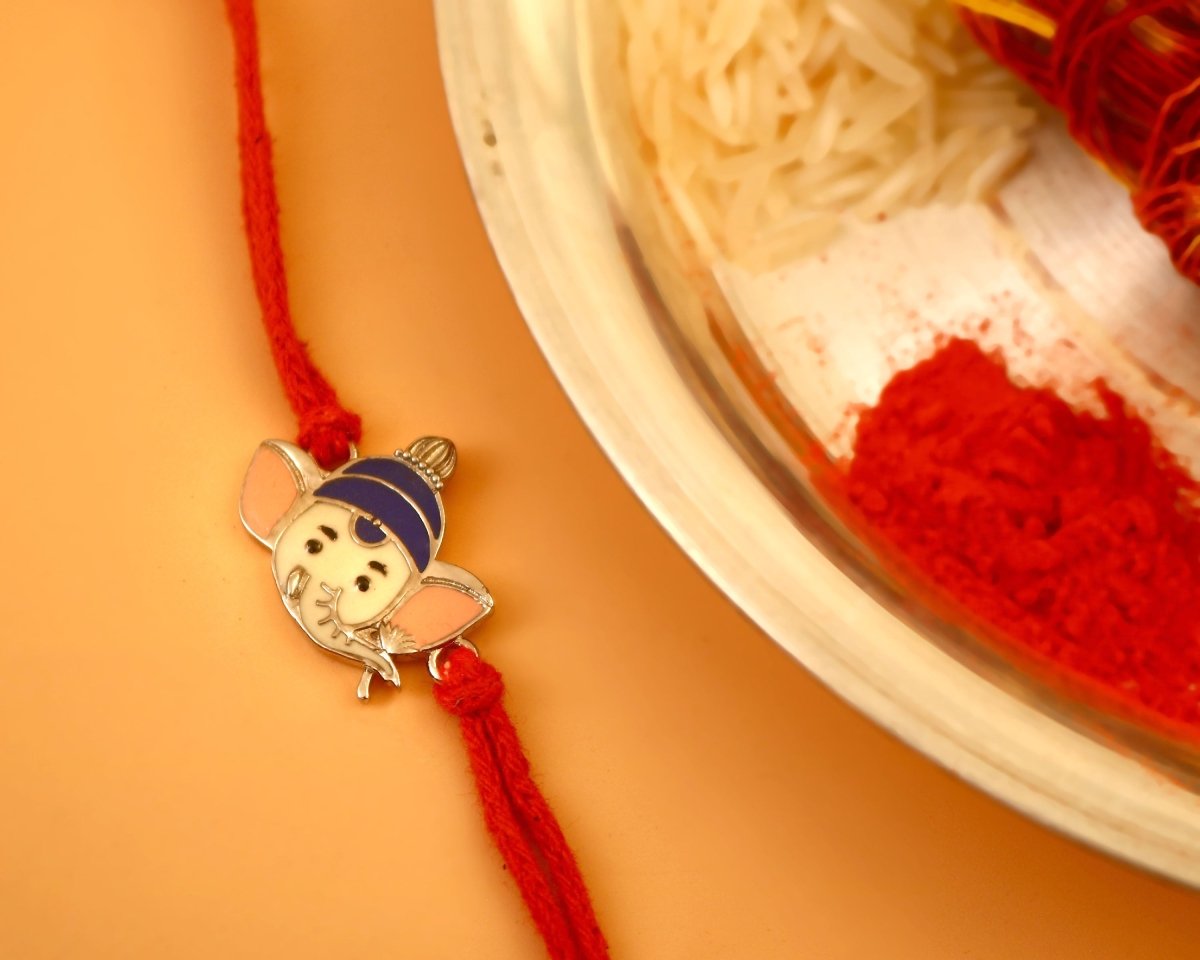 Dual-Tone Lord Ganesha Silver Rakhi with Red Thread - Zirak Silver