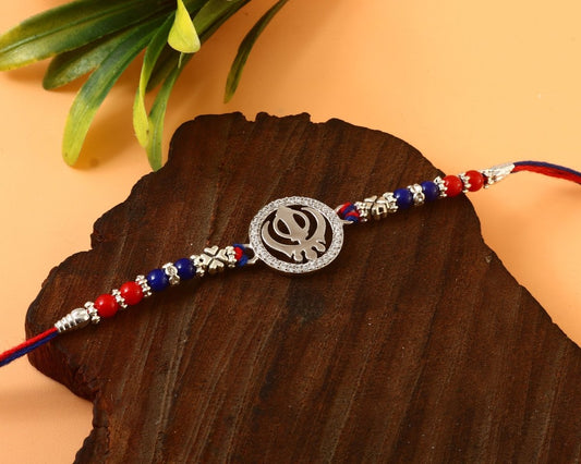 Khanda Symbol Rakhi with Red-Blue Beads | Sikh Religious Rakhi for Brother - Zirak Silver