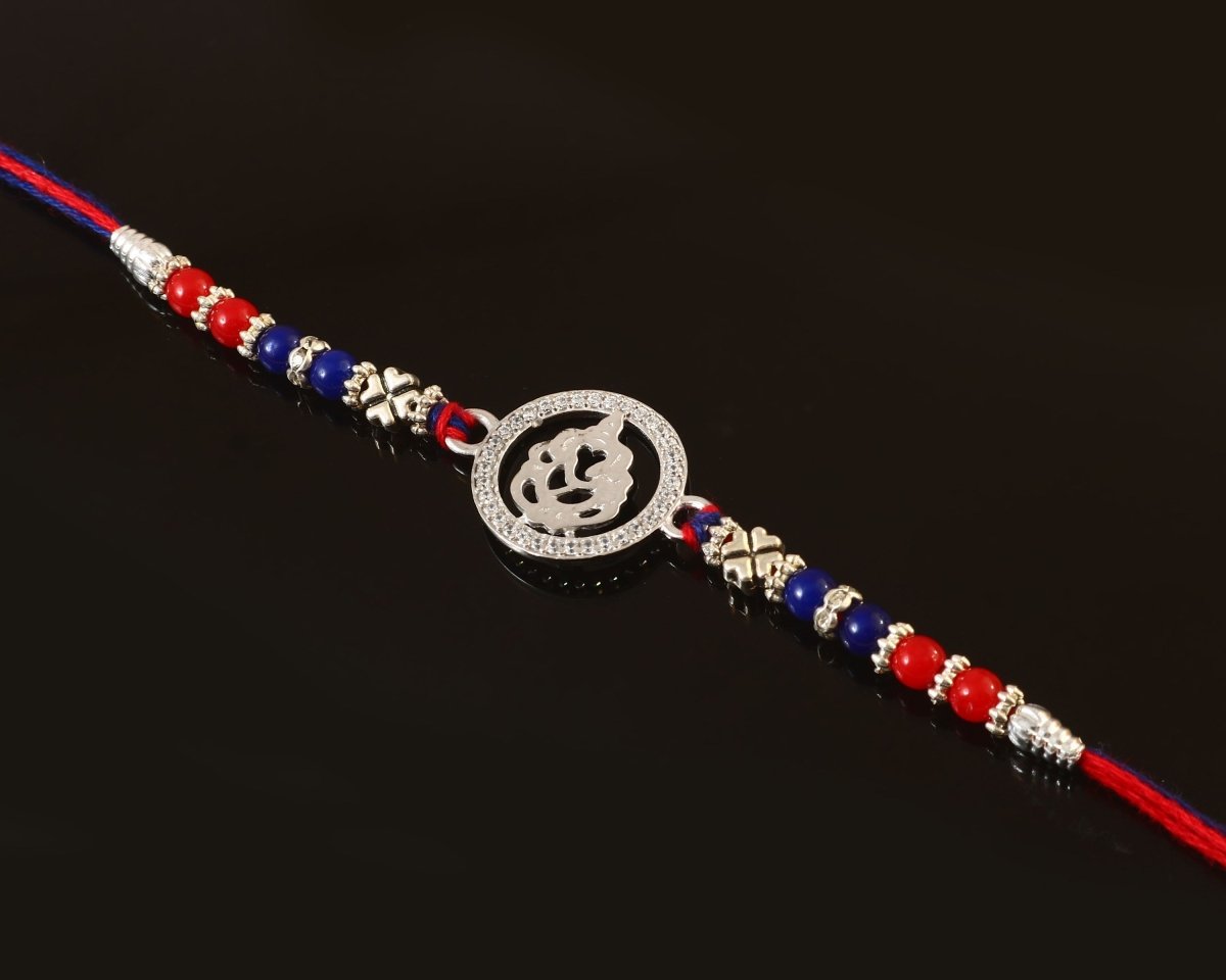Silver Ganesh Ji Rakhi | Religious Rakhi with CZ Studded Frame | Raksha Bandhan Gift - Zirak Silver
