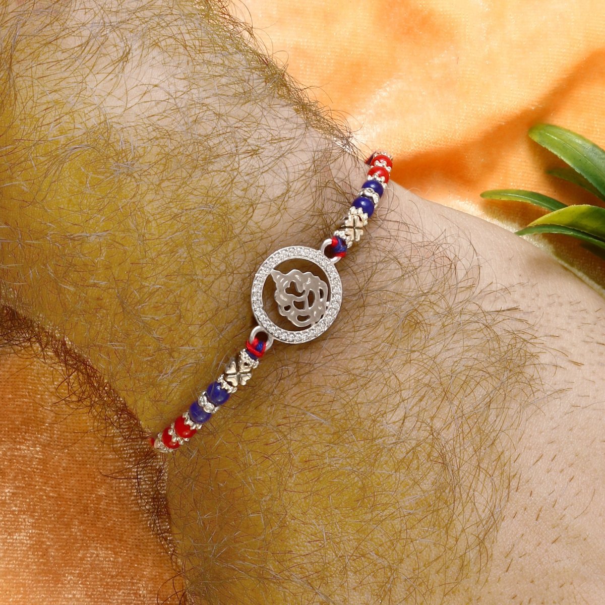 Silver Ganesh Ji Rakhi | Religious Rakhi with CZ Studded Frame | Raksha Bandhan Gift - Zirak Silver