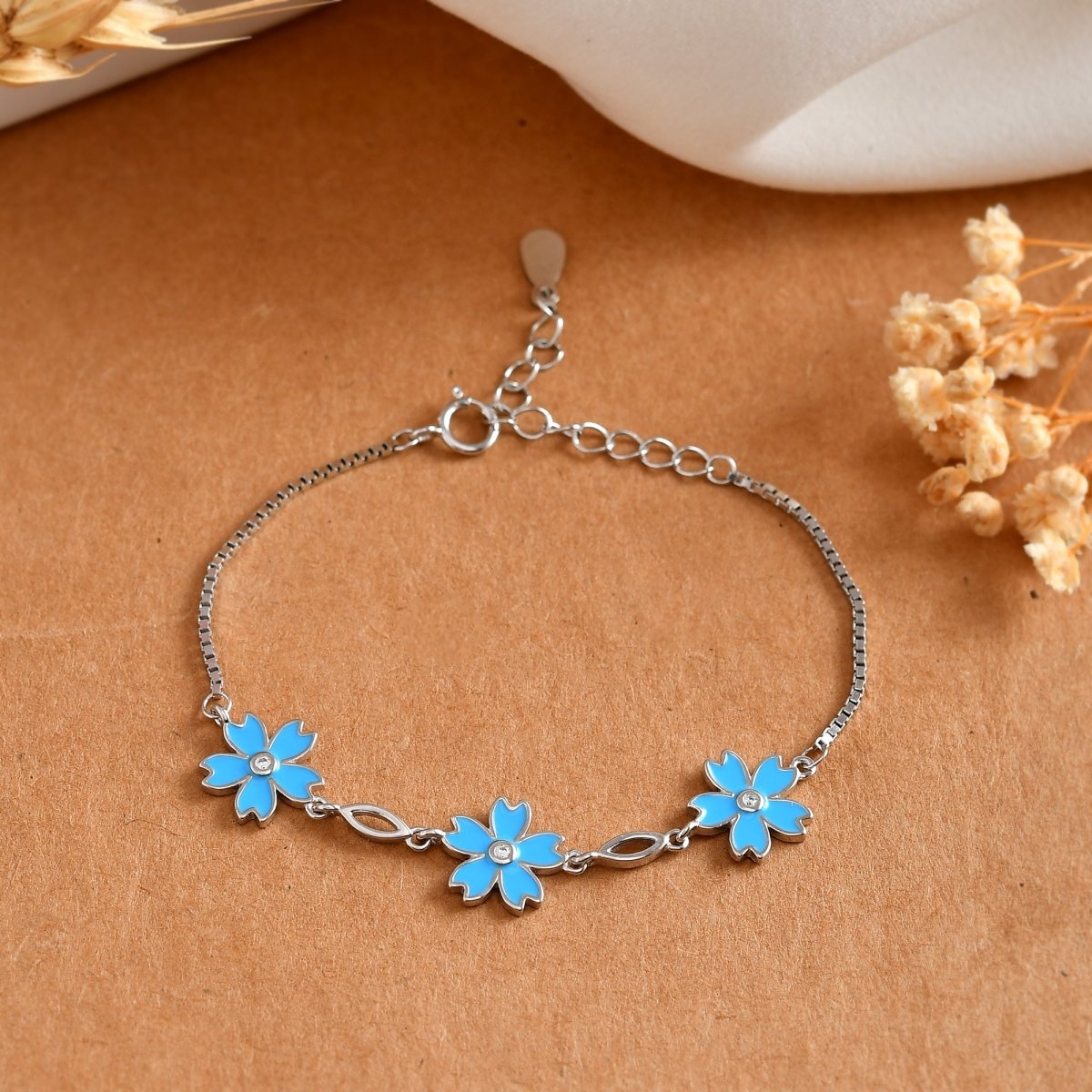 Sterling Silver Blue Enamel Flower Charm Bracelet with Cubic Zirconia Centers – Adjustable Floral Jewelry Gift - Zirak Silver