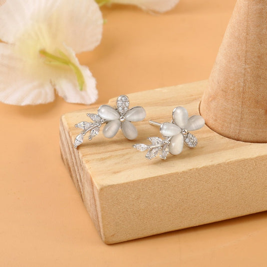 White Floral Silver Stud Earrings – Cat - Eye Petal Flower Earrings with CZ Leaf Detailing - Zirak Silver